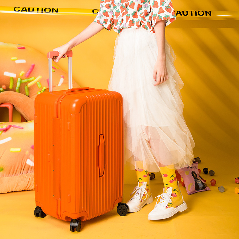 Fashionable candy colored thick ABS+PC luggage with 24-34 inch business travel pressure resistant and drop resistant universal wheels